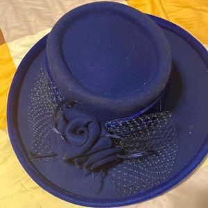 Blue hat with flower on the side